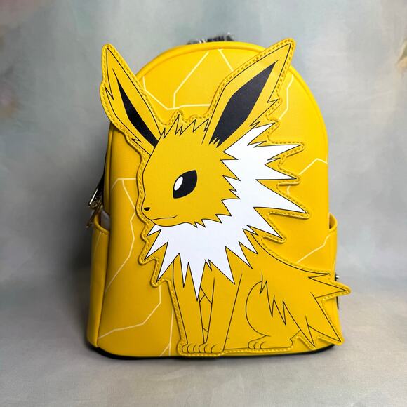 NWT Loungefly X Pokemon Glow In The Dark Jolteon 135 Mini Backpack - Picture 1 of 8